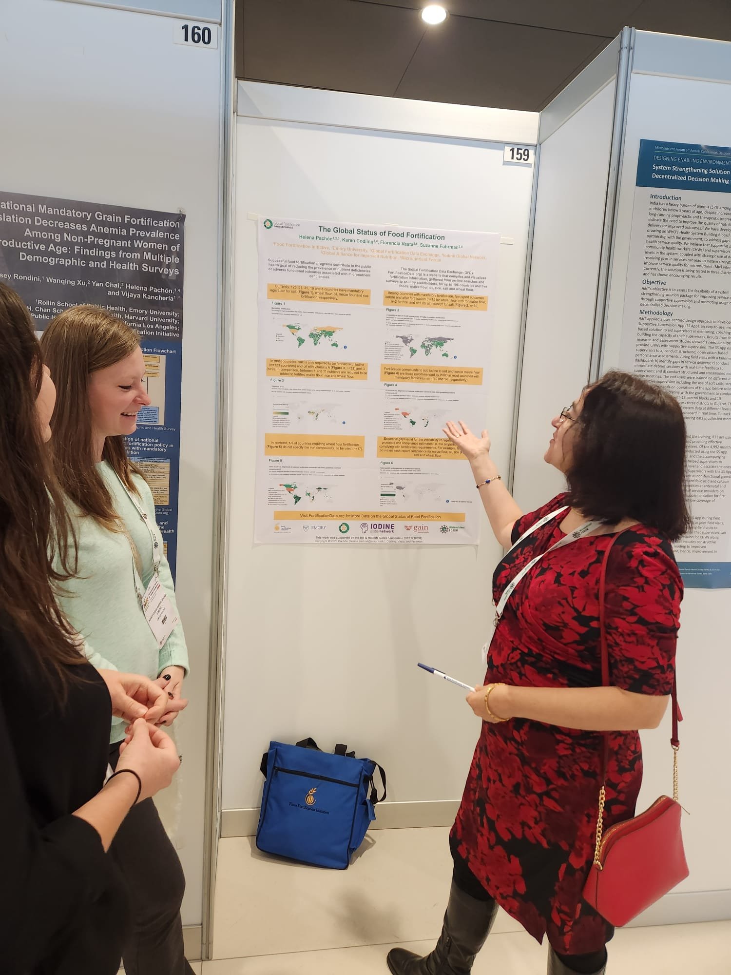 Photo: Helena presents a poster at the conference