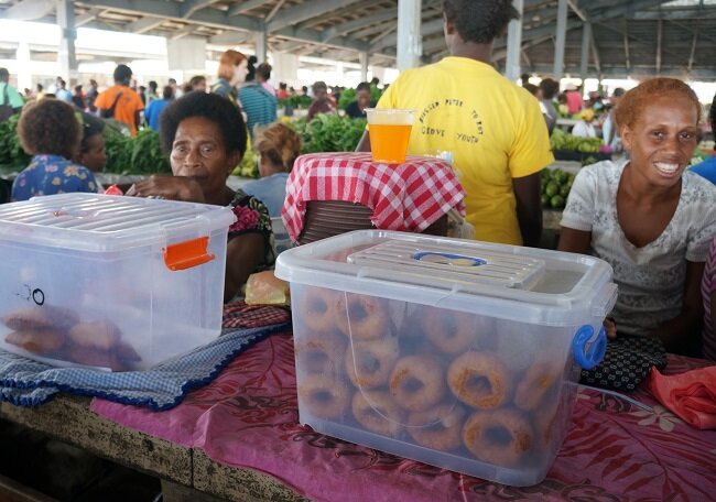 Photo: Baked goods sold in informal markets, such as these items for sale in Honiara, Solomon Islands, are likely made from industrially milled flour. (Becky Tsang)